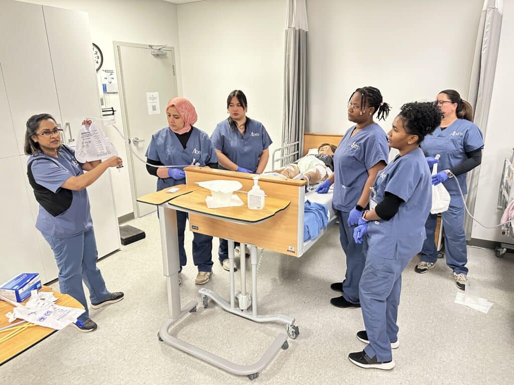 ABES College students participating in health care training